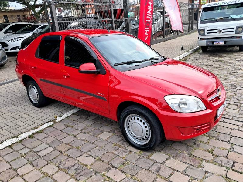 CHEVROLET - PRISMA - 2010/2011 - Vermelha - R$ 29.900,00