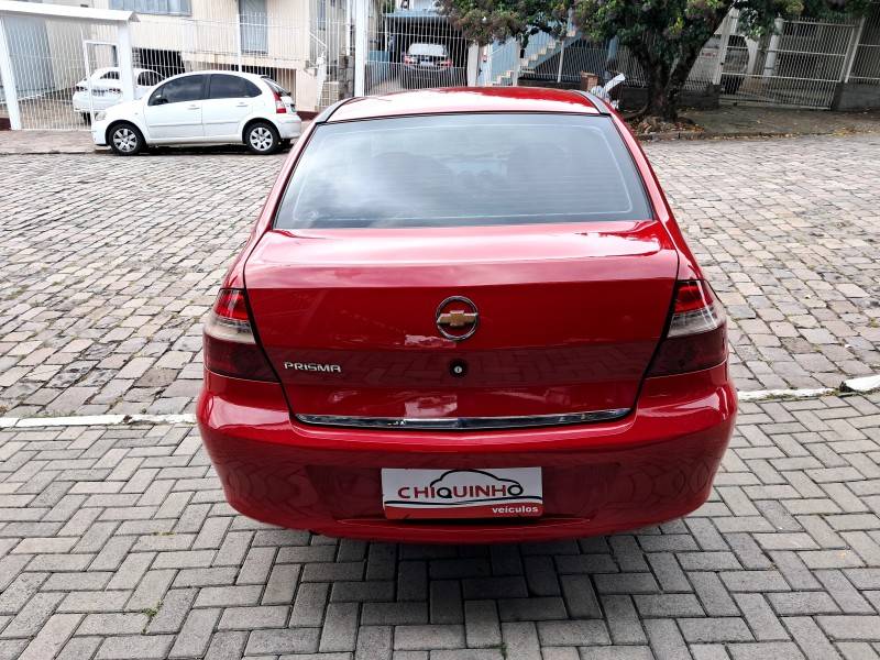 CHEVROLET - PRISMA - 2010/2011 - Vermelha - R$ 29.900,00