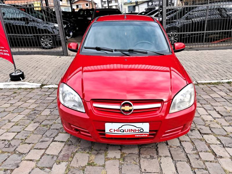 CHEVROLET - PRISMA - 2010/2011 - Vermelha - R$ 29.900,00