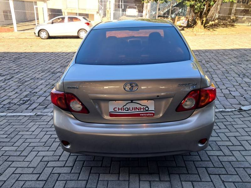 TOYOTA - COROLLA - 2010/2011 - Bege - R$ 56.900,00