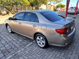 TOYOTA - COROLLA - 2010/2011 - Bege - R$ 56.900,00